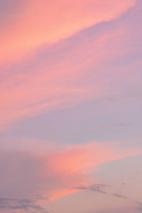 Low angle view of dramatic sky during sunset