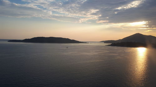 Scenic view of sea against sky at sunset