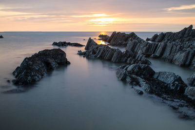 Scenic view of sea during sunset