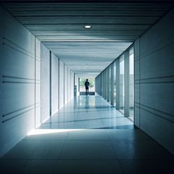 Full length of woman walking in corridor