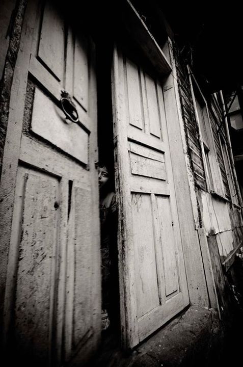 architecture, built structure, building exterior, door, window, house, closed, old, abandoned, wood - material, residential structure, weathered, low angle view, residential building, obsolete, damaged, run-down, building, safety, day