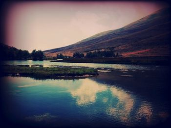 Scenic view of lake against sky