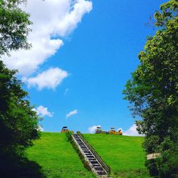 Scenic view of landscape against blue sky