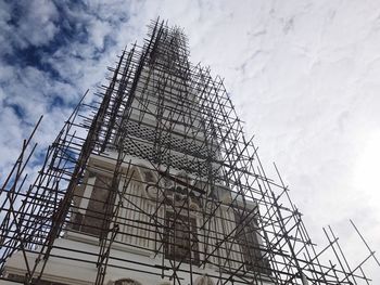 Low angle view of construction site against sky