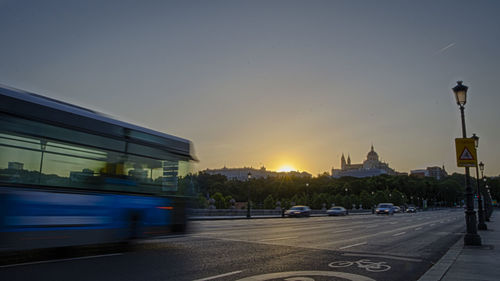 Blurred motion of cars moving on road