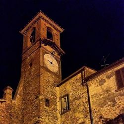 Low angle view of building at night