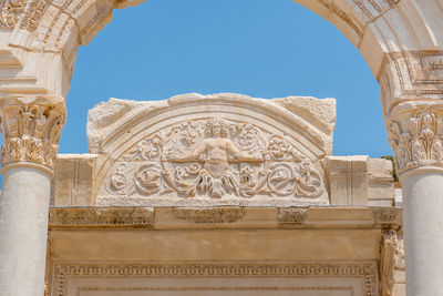 Low angle view of ornate building against sky