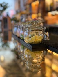 Close-up of glass jar on table