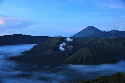 View of volcanic landscape against sky