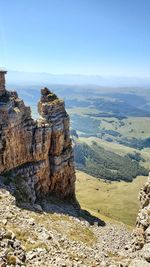 Scenic view of rock formations against sky