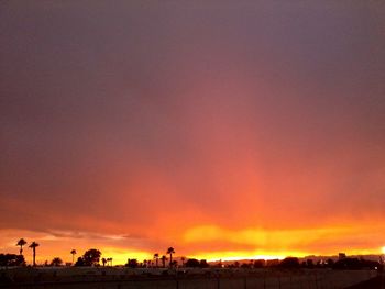 Scenic view of dramatic sky during sunset