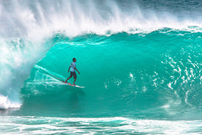 Man surfing in sea