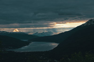 Scenic view of mountains against sky during sunset