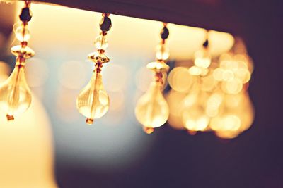 Close-up of decorations hanging from lamp shade