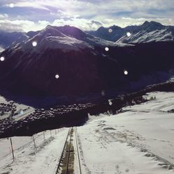 Scenic view of snow covered mountains