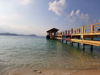Pier on sea against sky