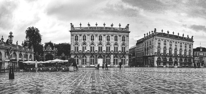 architecture, building exterior, built structure, sky, history, famous place, cloud - sky, travel destinations, tourism, architectural column, facade, travel, incidental people, cloudy, city, cloud, town square, international landmark, statue, art and craft