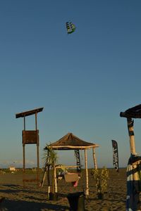 Parasol against clear blue sky