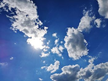 Low angle view of blue sky and clouds