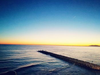 Scenic view of sea against clear sky