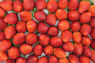 Full frame shot of strawberries for sale at market
