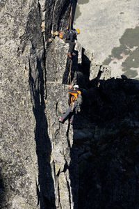 People climbing on rock