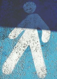 High angle view of pedestrian sign on street