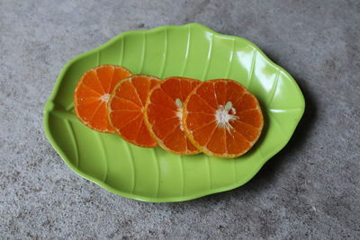 High angle view of orange slices on table