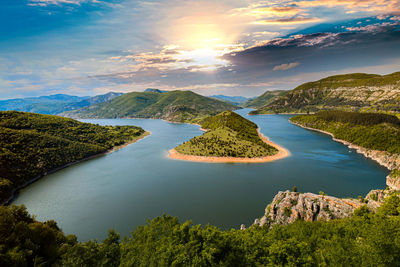 High angle view of sea against sky during sunset