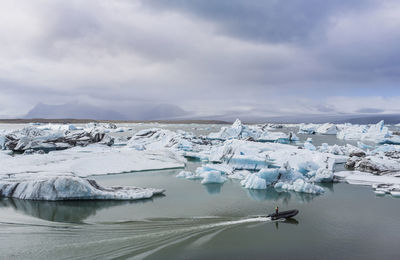 Scenic view of jokulsarlon lagoon against cloudy sky