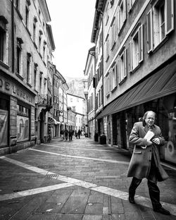 Woman walking on city street