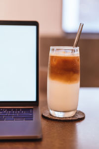 Close-up of coffee served on table