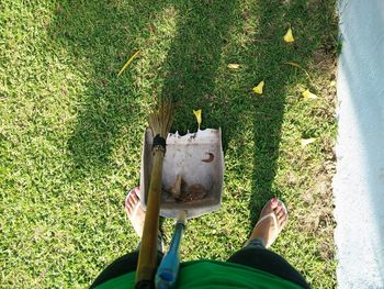 Shadow of person on grass