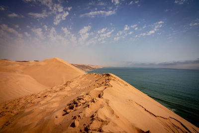 Scenic view of desert against sky