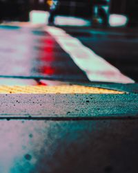 Close-up of arrow symbol on road