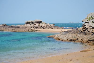 Scenic view of sea against clear blue sky