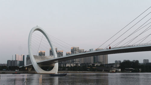 View of suspension bridge in city