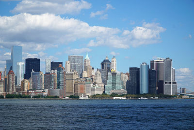 Modern buildings in city against sky