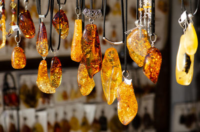 Amber necklace. amber of different colors and sizes. exposition of stones of amber for tourists
