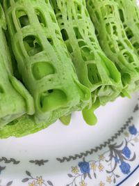 High angle view of chopped leaf in plate