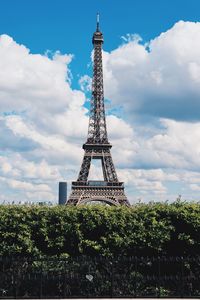 View of tower against cloudy sky