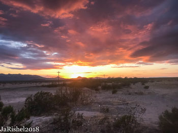 Scenic view of landscape against sky during sunset