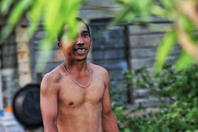 Portrait of shirtless manual worker