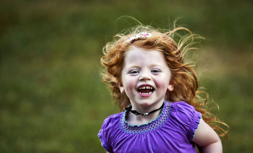 Close-up of girl smiling