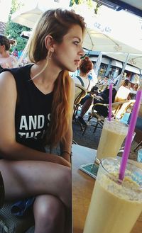 Woman sitting in restaurant