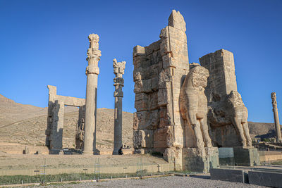 Old ruins of temple against clear sky