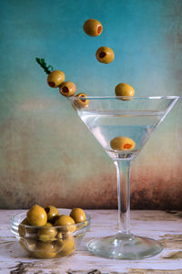 Close-up of wine and glass on table