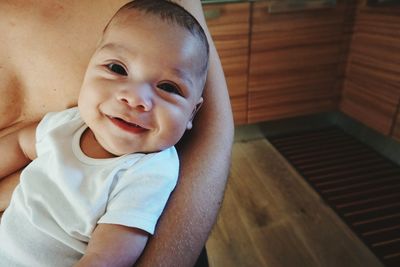 Portrait of cute baby at home