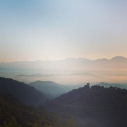 Scenic view of mountains against sky during sunset