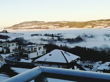 Scenic view of sea against sky during winter